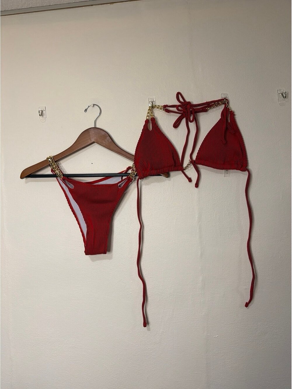 Red ribbed bikini with gold chain detail